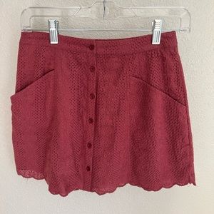 Pink crochet/ lace mini skirt with pockets.